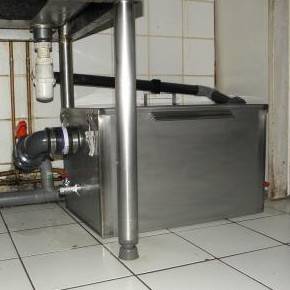 Pompage au vacuum de trappe à graisse